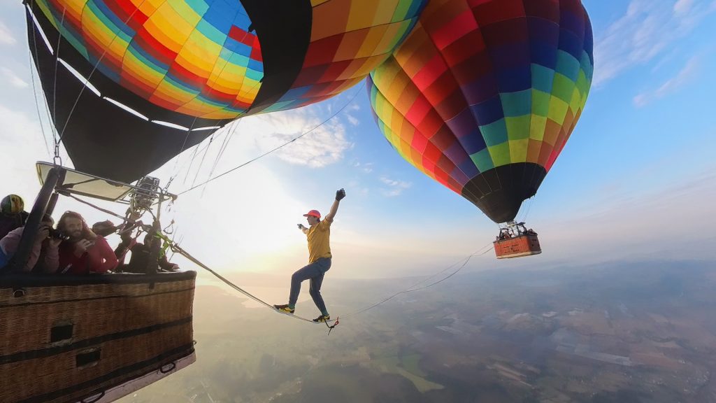 Vail man slacklines between 2 hot air balloons in Brazil - Vimarsana News